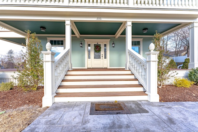 doorway to property with covered porch
