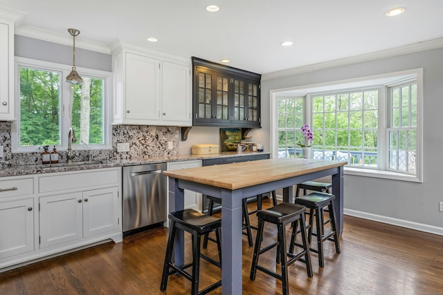 11 Thomas Rd, Westport, CT 06880 - kitchen featuring stainless steel dishwasher, a sink, backsplash, dark wood-style floors, and crown molding