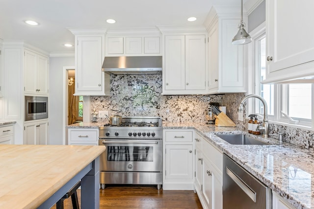 11 Thomas Rd, Westport, CT 06880 - kitchen featuring stainless steel appliances, under cabinet range hood, white cabinetry, and recessed lighting