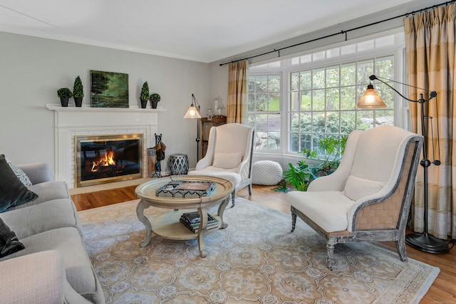 11 Thomas Rd, Westport, CT 06880 - living room with wood finished floors, ornamental molding, and a glass covered fireplace