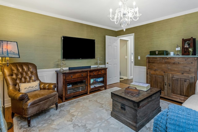 11 Thomas Rd, Westport, CT 06880 - living room featuring a chandelier, wainscoting, ornamental molding, and wallpapered walls