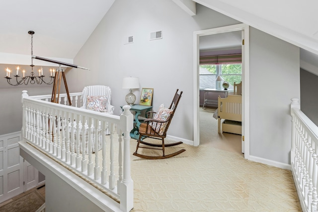 11 Thomas Rd, Westport, CT 06880 - corridor featuring an upstairs landing, lofted ceiling, and a chandelier