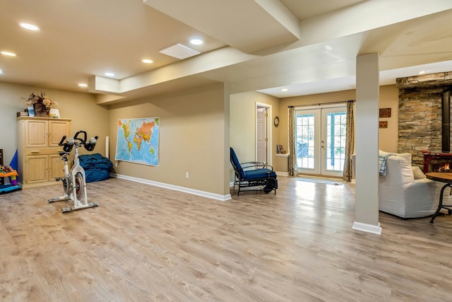 11 Thomas Rd, Westport, CT 06880 - exercise room featuring baseboards, french doors, light wood-style flooring, and recessed lighting