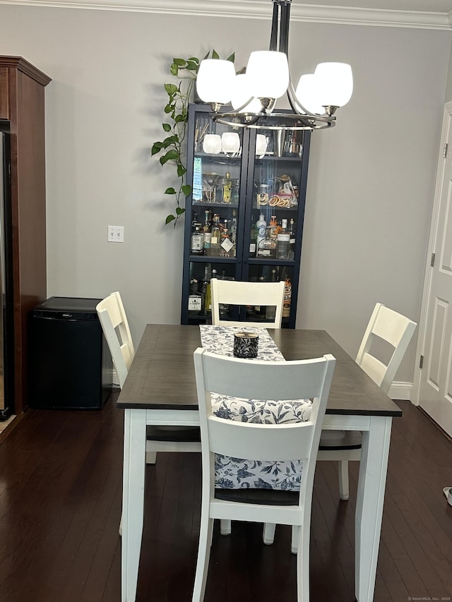 95 S Ridge Ln Unit D201, Berlin, CT 06037 - dining space with a chandelier, dark wood-type flooring, and ornamental molding