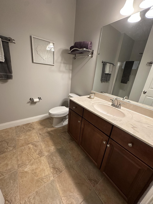 95 S Ridge Ln Unit D201, Berlin, CT 06037 - bathroom featuring toilet, vanity, a shower with shower door, and baseboards