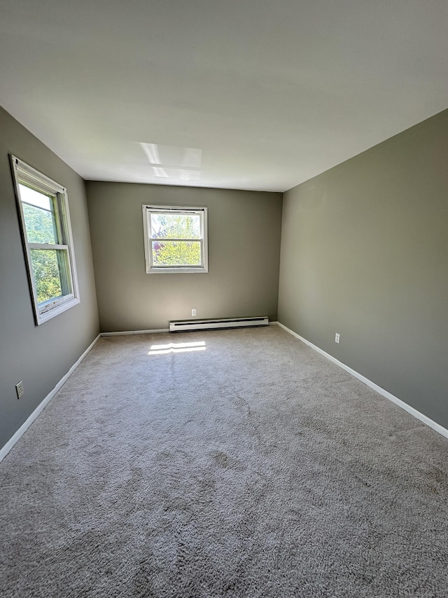 48 Canterbury Dr, Durham, CT 06422 - unfurnished room with a baseboard radiator, baseboards, and carpet flooring