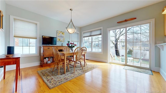 196 Jefferson St, Stratford, CT 06615 - dining area with light wood-style floors and baseboards