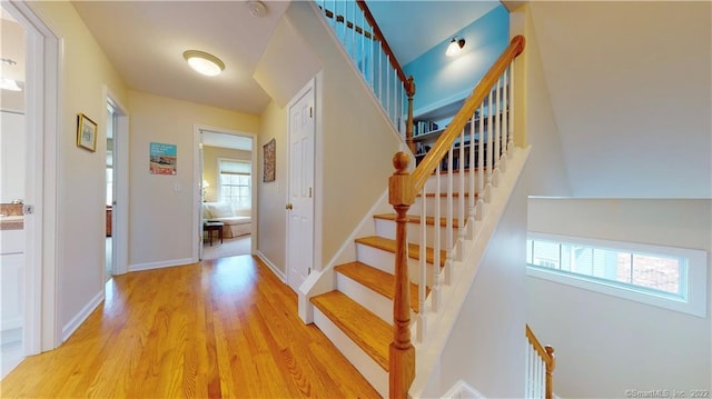 196 Jefferson St, Stratford, CT 06615 - staircase featuring wood finished floors and baseboards