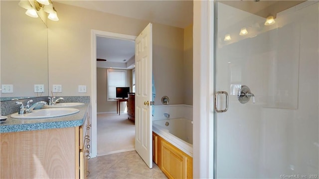 196 Jefferson St, Stratford, CT 06615 - bathroom with a shower stall, a bath, tile patterned flooring, and double vanity