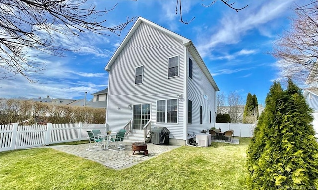 196 Jefferson St, Stratford, CT 06615 - rear view of house with entry steps, a patio area, and central air condition unit