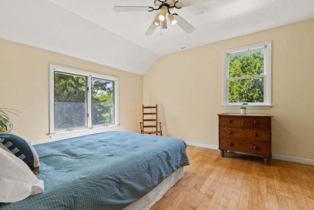 18 Charles St, Groton, CT 06355 - bedroom with multiple windows, light wood finished floors, baseboards, and lofted ceiling
