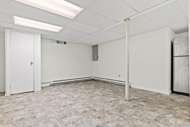 18 Charles St, Groton, CT 06355 - finished below grade area with a paneled ceiling, baseboard heating, and tile patterned floors
