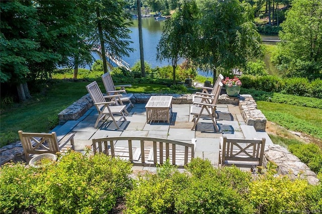 view of patio / terrace with a water view
