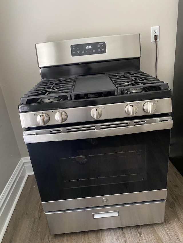 139 Fountain St Apt B9, New Haven, CT 06515 - kitchen view of stainless steel range with gas stovetop and wood finished floors