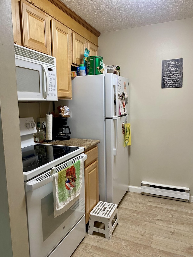 130 Coe Ave Unit 81, East Haven, CT 06512 - kitchen featuring white appliances, a baseboard heating unit, light brown cabinets, light wood-type flooring, and a textured ceiling