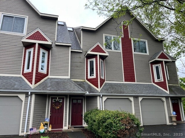 346 Prospect Ave Unit 3, New Haven, CT 06512 - view of property with an attached garage and roof with shingles