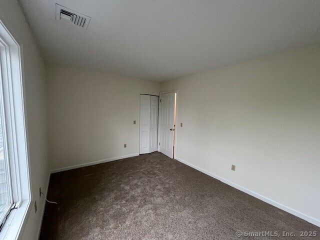 346 Prospect Ave Unit 3, New Haven, CT 06512 - empty room with dark carpet and baseboards