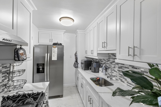 2370 N Ave Unit 12G, Bridgeport, CT 06604 - kitchen featuring stainless steel refrigerator with ice dispenser, a sink, light marble finish floors, light stone countertops, and decorative backsplash