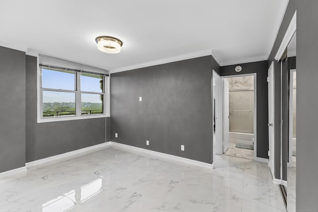 2370 N Ave Unit 12G, Bridgeport, CT 06604 - unfurnished room featuring baseboards, marble finish floors, crown molding, and a smoke detector