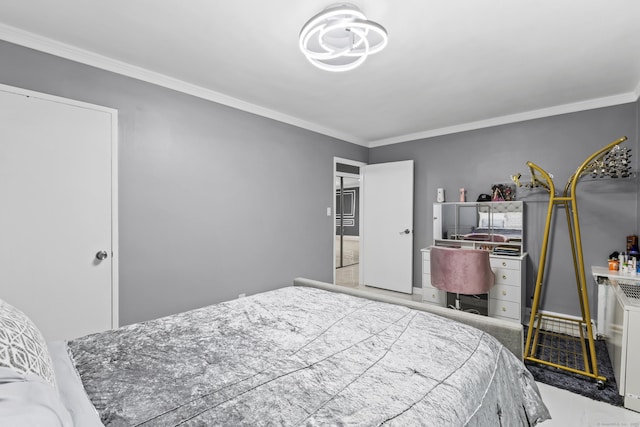2370 N Ave Unit 12G, Bridgeport, CT 06604 - bedroom with crown molding, a chandelier, and baseboards