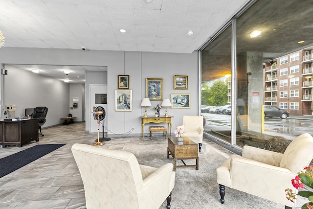 2370 N Ave Unit 12G, Bridgeport, CT 06604 - living area with an office area, a wall of windows, and recessed lighting