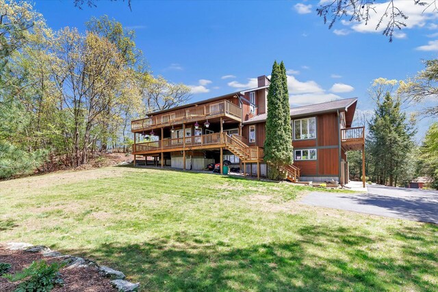 81 Georges Ln, Monroe, CT 06468 - back of house with stairway, a wooden deck, and a yard