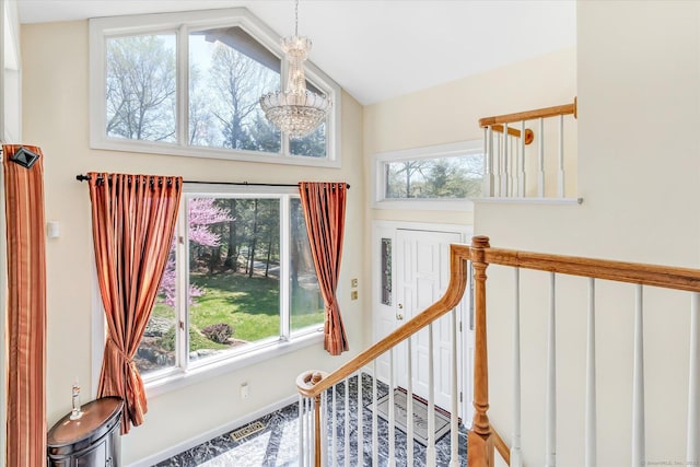 81 Georges Ln, Monroe, CT 06468 - foyer entrance with a chandelier, lofted ceiling, baseboards, and stairway