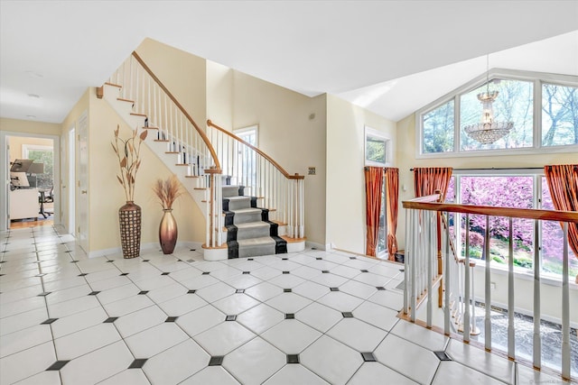 81 Georges Ln, Monroe, CT 06468 - foyer with stairway, tile patterned floors, baseboards, and lofted ceiling