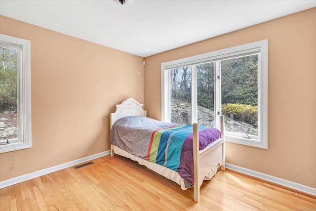 81 Georges Ln, Monroe, CT 06468 - bedroom with baseboards and light wood-type flooring