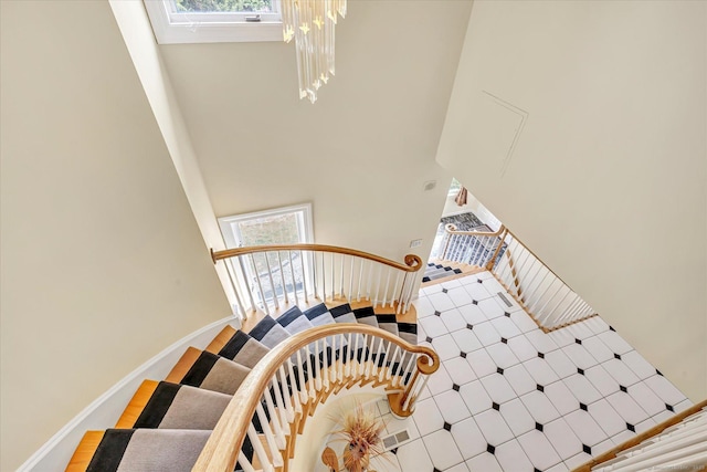 81 Georges Ln, Monroe, CT 06468 - stairway with a towering ceiling and baseboards