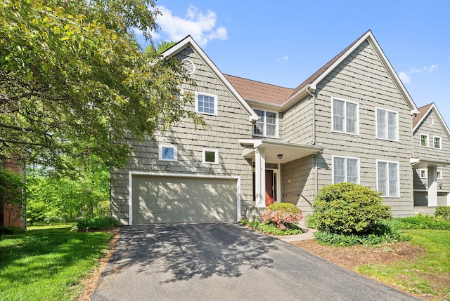 5 Harwich Ln Unit 5, West Hartford, CT 06117 - view of front of home with driveway, a garage, roof with shingles, and a front lawn