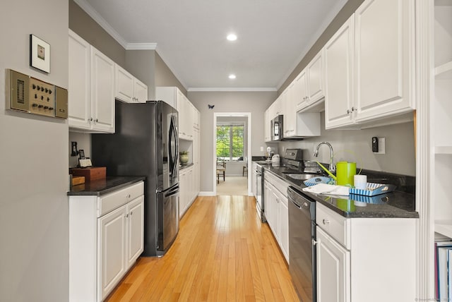 5 Harwich Ln Unit 5, West Hartford, CT 06117 - kitchen featuring black appliances, a sink, dark countertops, white cabinetry, and recessed lighting