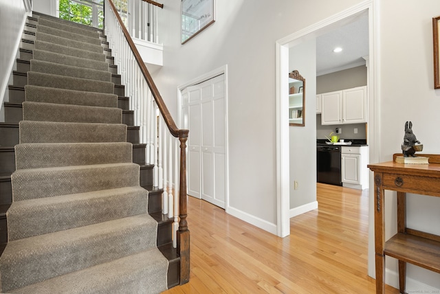 5 Harwich Ln Unit 5, West Hartford, CT 06117 - stairs with wood finished floors, baseboards, and recessed lighting