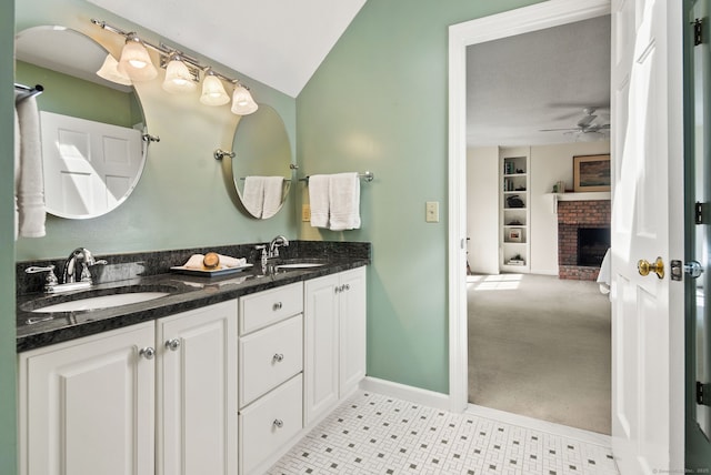 5 Harwich Ln Unit 5, West Hartford, CT 06117 - full bathroom with a ceiling fan, a fireplace, double vanity, built in features, and baseboards
