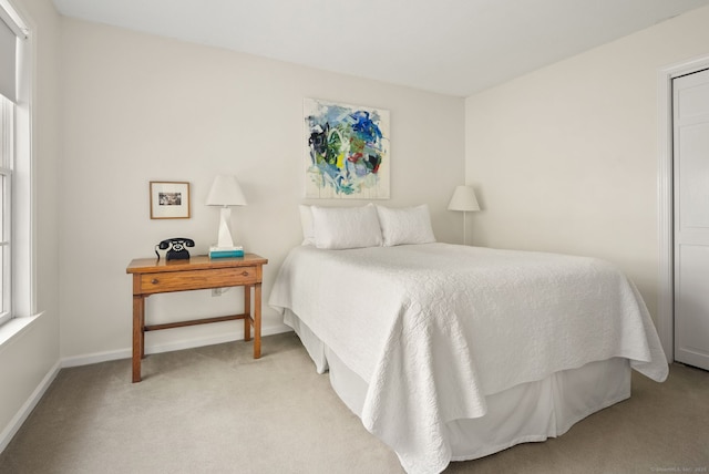 5 Harwich Ln Unit 5, West Hartford, CT 06117 - bedroom with light carpet and baseboards
