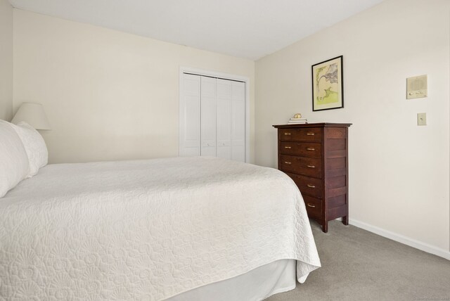 5 Harwich Ln Unit 5, West Hartford, CT 06117 - bedroom featuring carpet flooring, a closet, and baseboards
