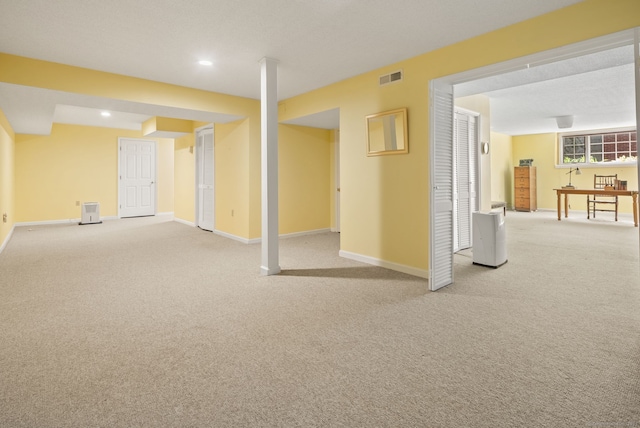 5 Harwich Ln Unit 5, West Hartford, CT 06117 - below grade area with carpet, baseboards, and recessed lighting