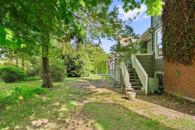 5 Harwich Ln Unit 5, West Hartford, CT 06117 - view of green lawn featuring stairs and central air condition unit