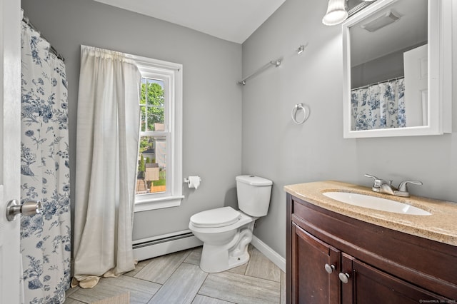 29 E Cliff St, Norwich, CT 06360 - bathroom with a baseboard heating unit, toilet, vanity, and baseboards