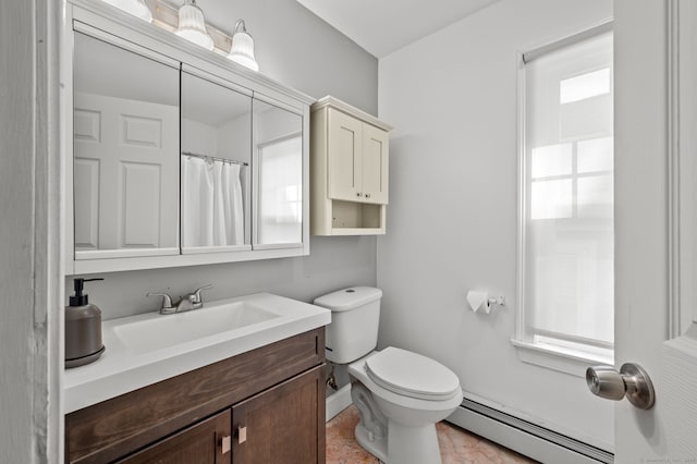 29 E Cliff St, Norwich, CT 06360 - bathroom with a baseboard heating unit, toilet, baseboards, and vanity