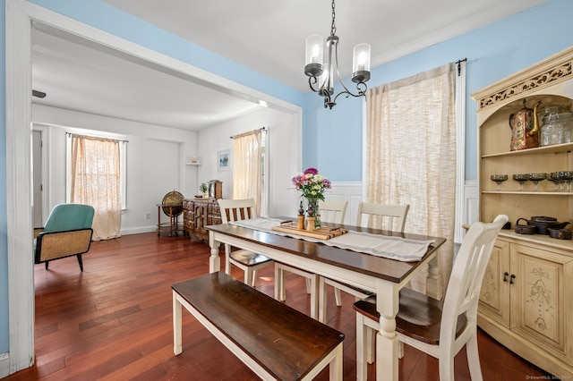 29 E Cliff St, Norwich, CT 06360 - dining area with a chandelier and dark wood finished floors