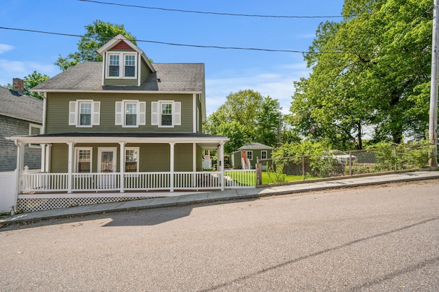 29 E Cliff St, Norwich, CT 06360 - view of front of home with a porch, fence, and a shingled roof