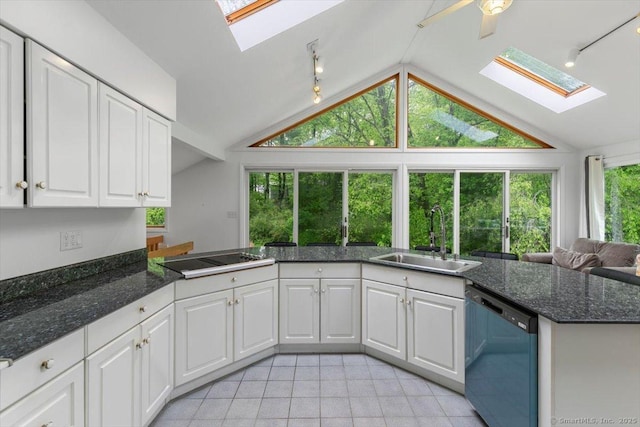 26 Jodi Dr, Wallingford, CT 06492 - kitchen featuring a skylight, dishwashing machine, a sink, rail lighting, and lofted ceiling