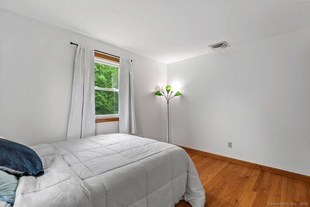 26 Jodi Dr, Wallingford, CT 06492 - bedroom featuring wood finished floors and baseboards