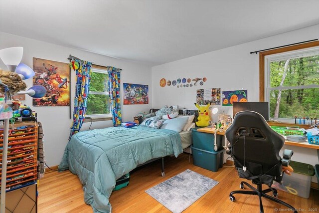 26 Jodi Dr, Wallingford, CT 06492 - bedroom featuring wood finished floors and an office area