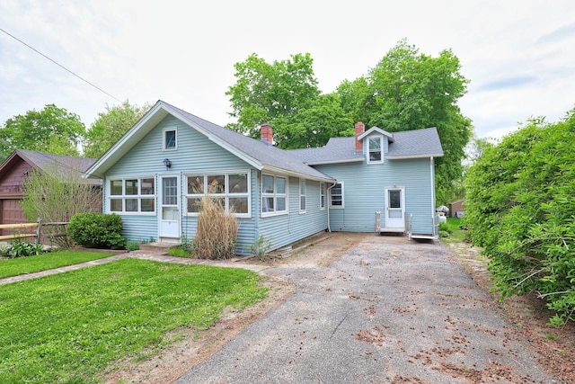 50 Hill Top Rd, Morris, CT 06763 - view of front of property with asphalt driveway, a chimney, a front lawn, roof with shingles, and entry steps