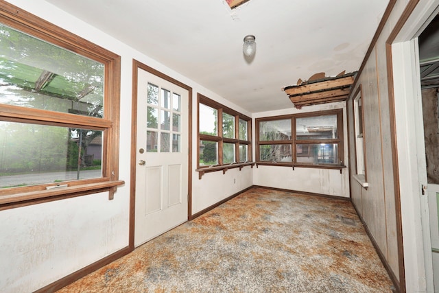 50 Hill Top Rd, Morris, CT 06763 - unfurnished sunroom featuring baseboards and carpet flooring