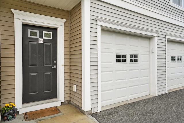 206 Copper Square Dr Unit 206, Bethel, CT 06801 - property entrance featuring a garage