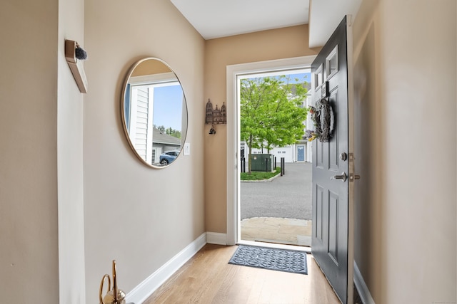 206 Copper Square Dr Unit 206, Bethel, CT 06801 - entryway featuring light wood-style flooring and baseboards
