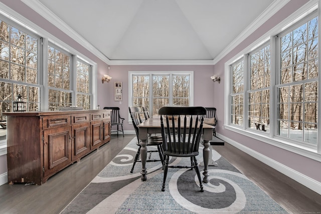 sunroom / solarium featuring plenty of natural light and lofted ceiling